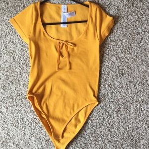 Mustard yellow body suit